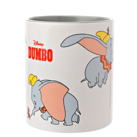 White stoneware Dumbo Elephant Mug with grey interior and handle, featuring Dumbo flying and walking with a small mouse, plus the red Disney Dumbo logo, on a plain background.