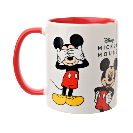Mickey Mouse stoneware mug, 325ml, white body with red handle and interior, printed with Mickey covering his eyes and standing with hands on hips, shown on a plain background.