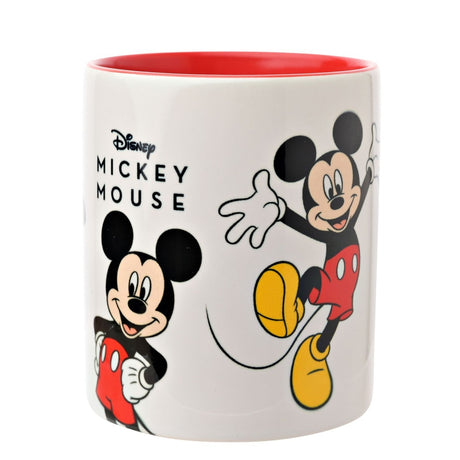 White stoneware Mickey Mouse mug, 325ml, with red interior, printed poses of Mickey in red shorts and yellow shoes, on a plain white background.