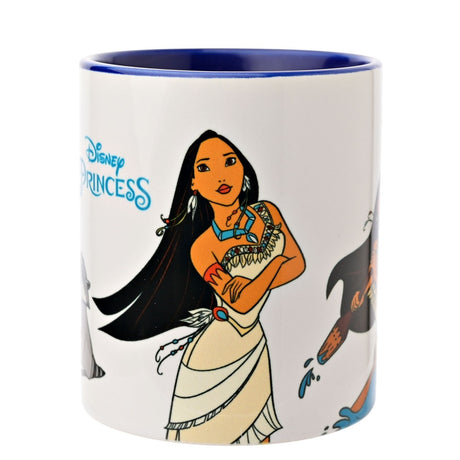 White stoneware Pocahontas mug, 325ml, with dark blue handle and interior, showing Pocahontas standing with arms folded beside Meeko and another character on a plain white background.