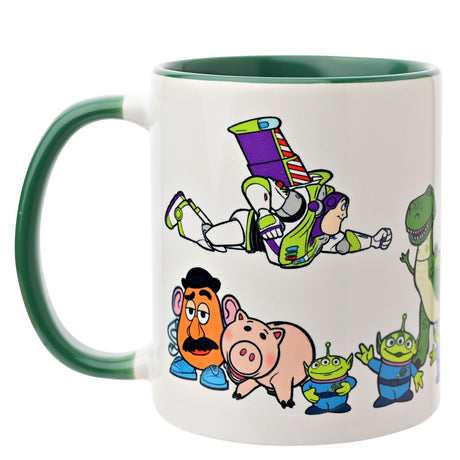 Toy Story 4 stoneware mug, 325ml, white glossy body with green interior and handle, printed with Buzz Lightyear, Rex, Mr Potato Head, Hamm and three-eyed aliens, on a plain background.