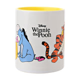 White stoneware mug, 325ml, with yellow interior, featuring printed Winnie the Pooh, Eeyore and Tigger characters and Disney logo text, shown on a plain white background.