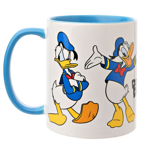 White stoneware Donald Duck mug, 325ml, with blue interior and handle, printed with Donald in his sailor jacket and cap, shown arms crossed and waving, on a plain background.