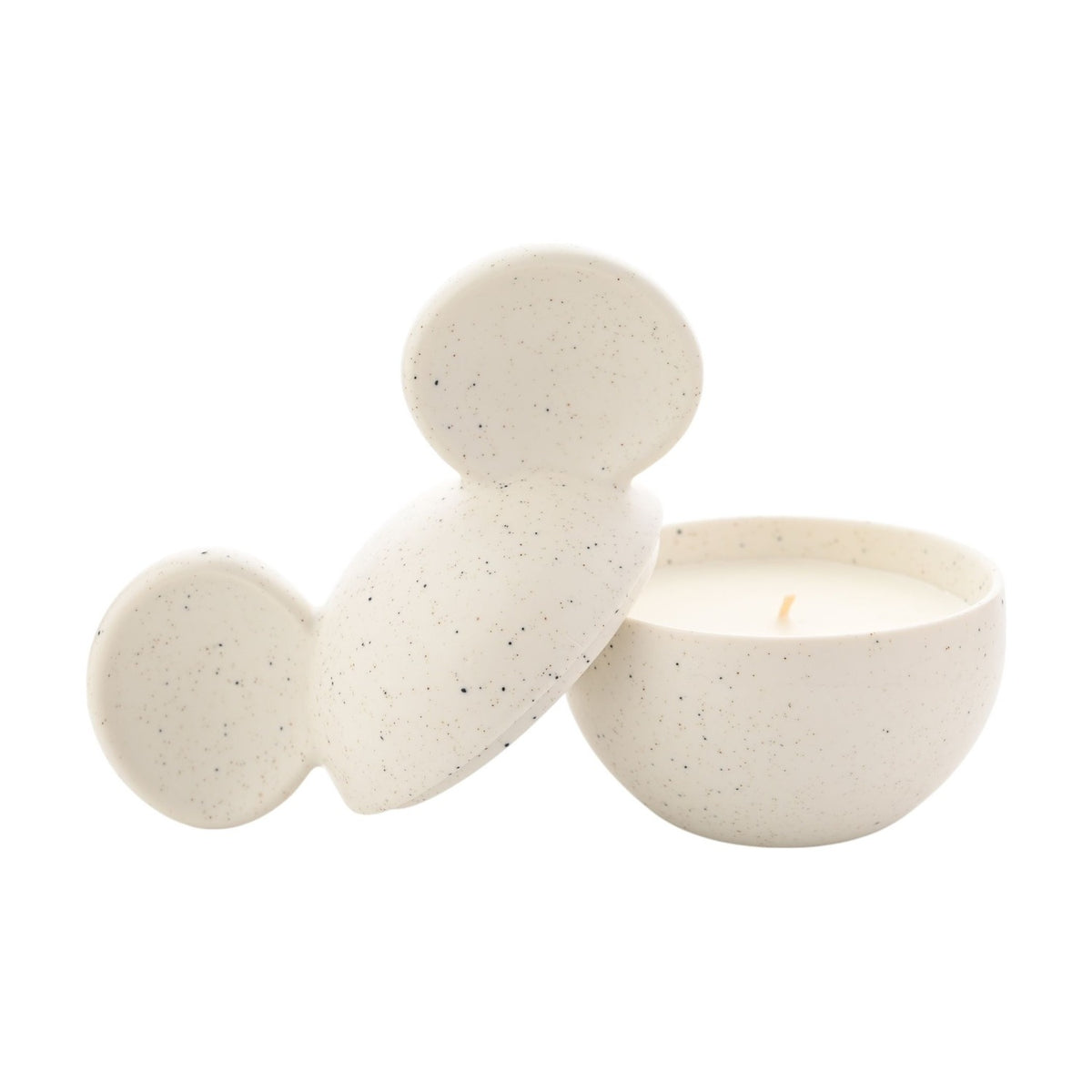 Mickey Mouse Head Ceramic Vessel Fragranced Candle in white, speckled finish, with ear-shaped lid removed to reveal single-wick candle in rounded bowl, on a plain white background.