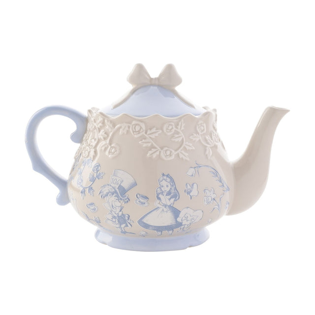 Alice in Wonderland stoneware teapot in beige with light blue handle, spout, and bow-shaped lid, featuring Alice and the Mad Hatter illustrations and a raised rose band, on a white background.