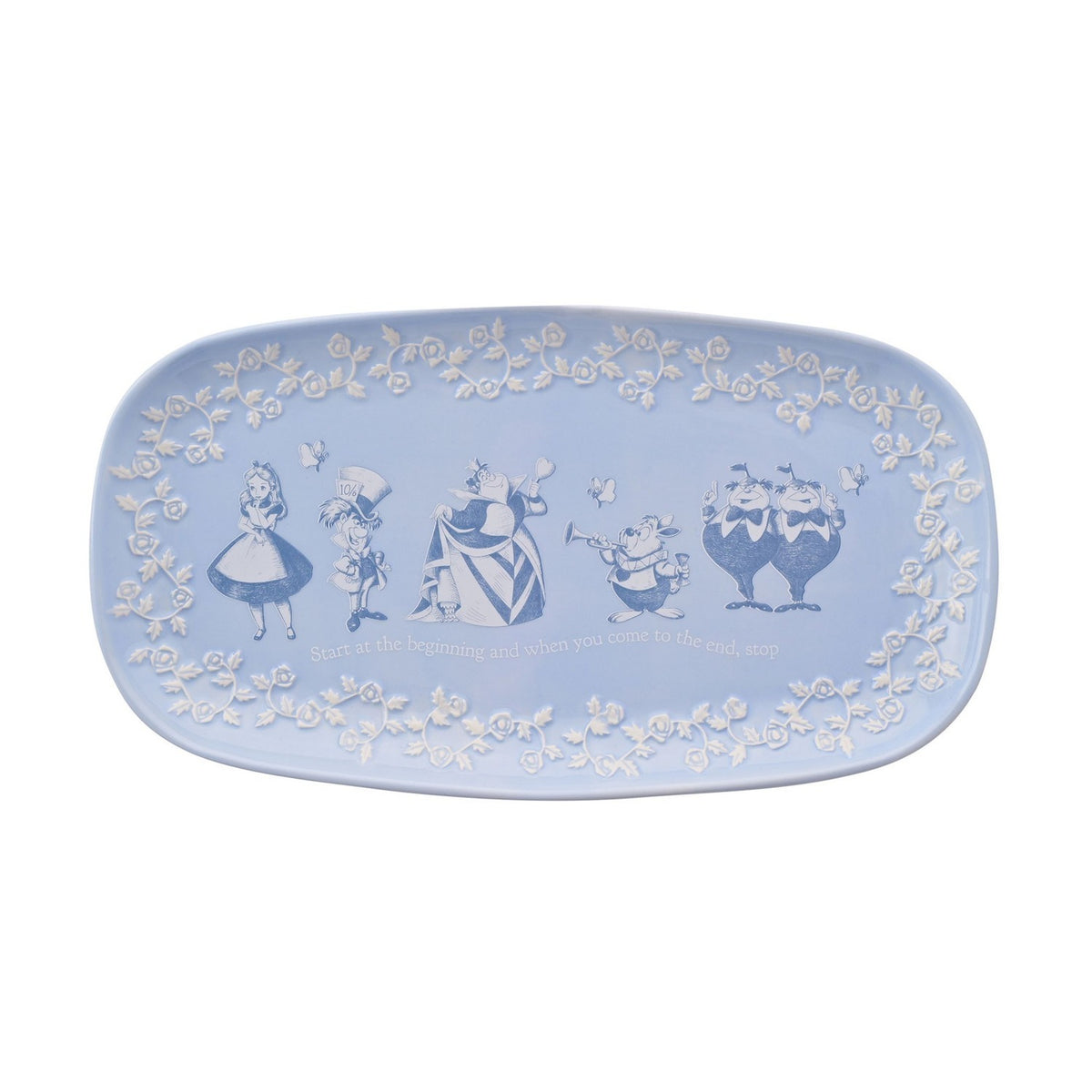 Rectangular blue glazed earthenware serving plate with white linework of Alice, the Mad Hatter, Queen of Hearts, White Rabbit and Tweedledum and Tweedledee, framed by a floral border.
