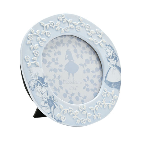 Round ceramic photo frame in pale powder blue with Alice and the Mad Hatter illustrations and raised white rose vine detailing, 4 x 4in, on a plain background.
