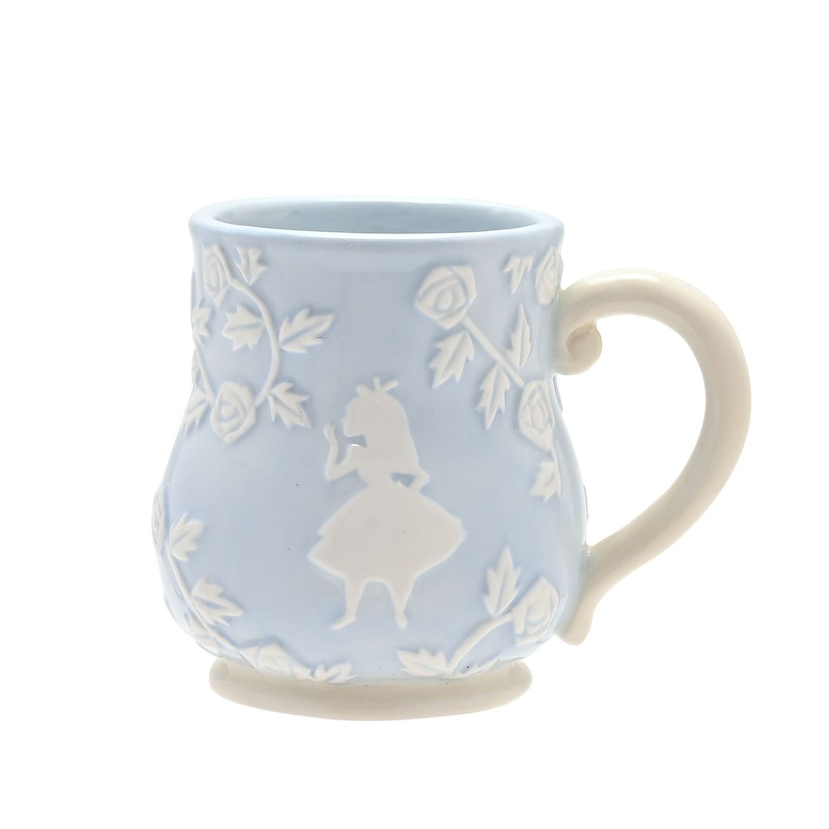 Blue earthenware mug with embossed white roses and leaves, featuring a raised white Alice in Wonderland silhouette and cream handle, set against a plain white background.