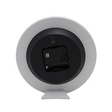 Rear view of the Mickey Mouse Real 999 Silverplated Wall Clock showing the black clock movement, battery slot and hanging hook on a white stand, set against a plain background.