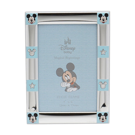 Mickey Mouse Border 999 silver plated photo frame, 6x4in, with colour Mickey faces at each corner and light blue tabs featuring Mickey silhouettes and stars, shown on a white background.