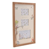 Brown wood Winnie the Pooh multi-aperture frame with off-white mount, three openings labelled first scan, second scan and first photo, Pooh illustrations, angled on white background.