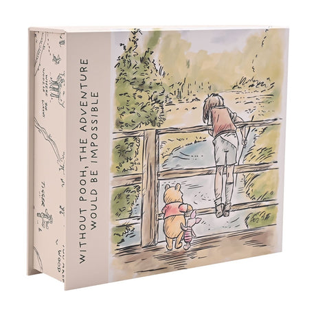 Cream rectangular Winnie the Pooh keepsake box featuring a watercolour print of Pooh, a friend and a boy at a wooden bridge, with spine text "Without Pooh, the adventure would be impossible."