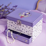 Snow White Musical Jewellery Box with Drawer and Mirror, lilac rectangular trinket box with floral print sides, silver clasp, open drawer showing pearl necklace, on a lavender backdrop.