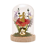 Light-up cloche decoration with a gold Snow White silhouette over a red rose reading "Lovely little Songbird," pastel lilac and white blooms on moss, in a clear arched dome on a wooden base.
