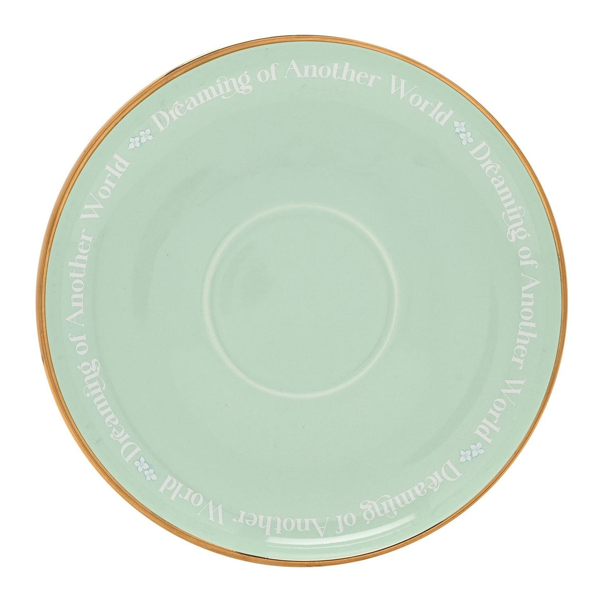 Porcelain saucer from the Pastel Princess Ariel Tea Cup & Saucer set, round pastel green with gold rim and repeated "Dreaming of Another World" text, shown on a white background.