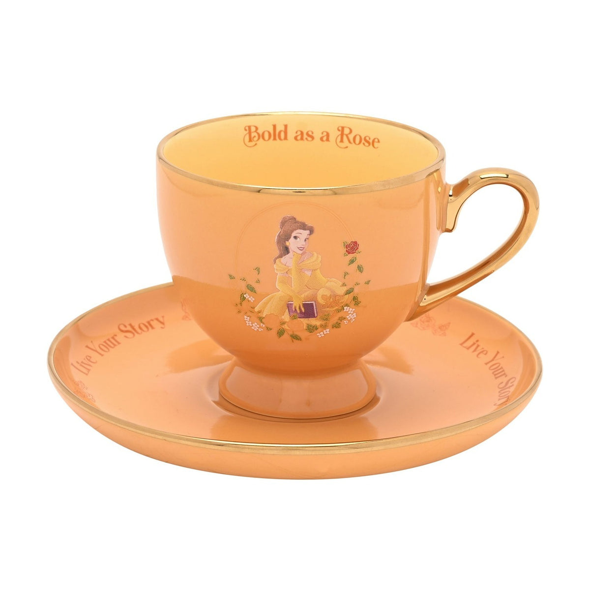 Yellow porcelain footed tea cup and saucer with gold trim, featuring Belle in her gown, Bold as a Rose on the rim, and Live Your Story on the saucer.