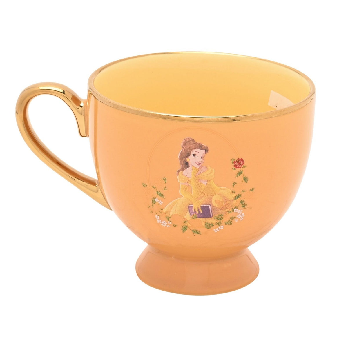 Yellow porcelain footed tea cup with gold handle and rim, featuring an illustration of Belle in her golden gown beside a red rose, on a plain white background.