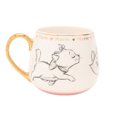 White porcelain mug with grey pencil-style sketches of Marie the kitten, gold rim and handle, "Marie" lettering with hearts under the rim, pink base band, 400ml, on a white background.
