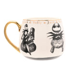 Cream porcelain mug with gold handle featuring black sketched Jack and Sally artwork and "Jack & Sally" lettered in gold below the rim, on a plain white background.