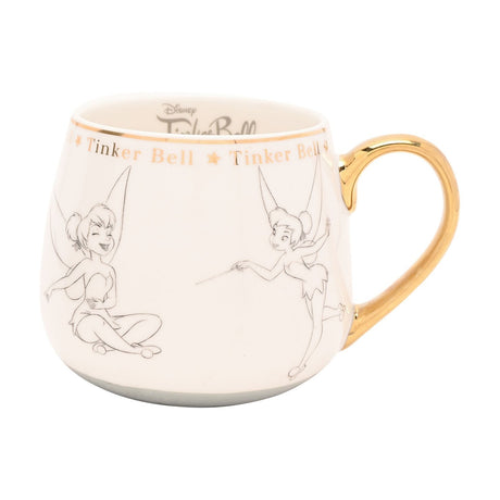 White porcelain Tinker Bell mug with grey pencil-style sketches of her in different poses, a gold handle, and a gold band repeating her name between small stars near the rim.
