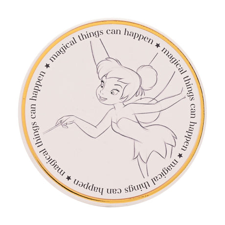 Round white stoneware coaster with a gold rim, featuring a pencil-style sketch of Tinker Bell mid-flight and the repeated text "magical things can happen" around the edge.