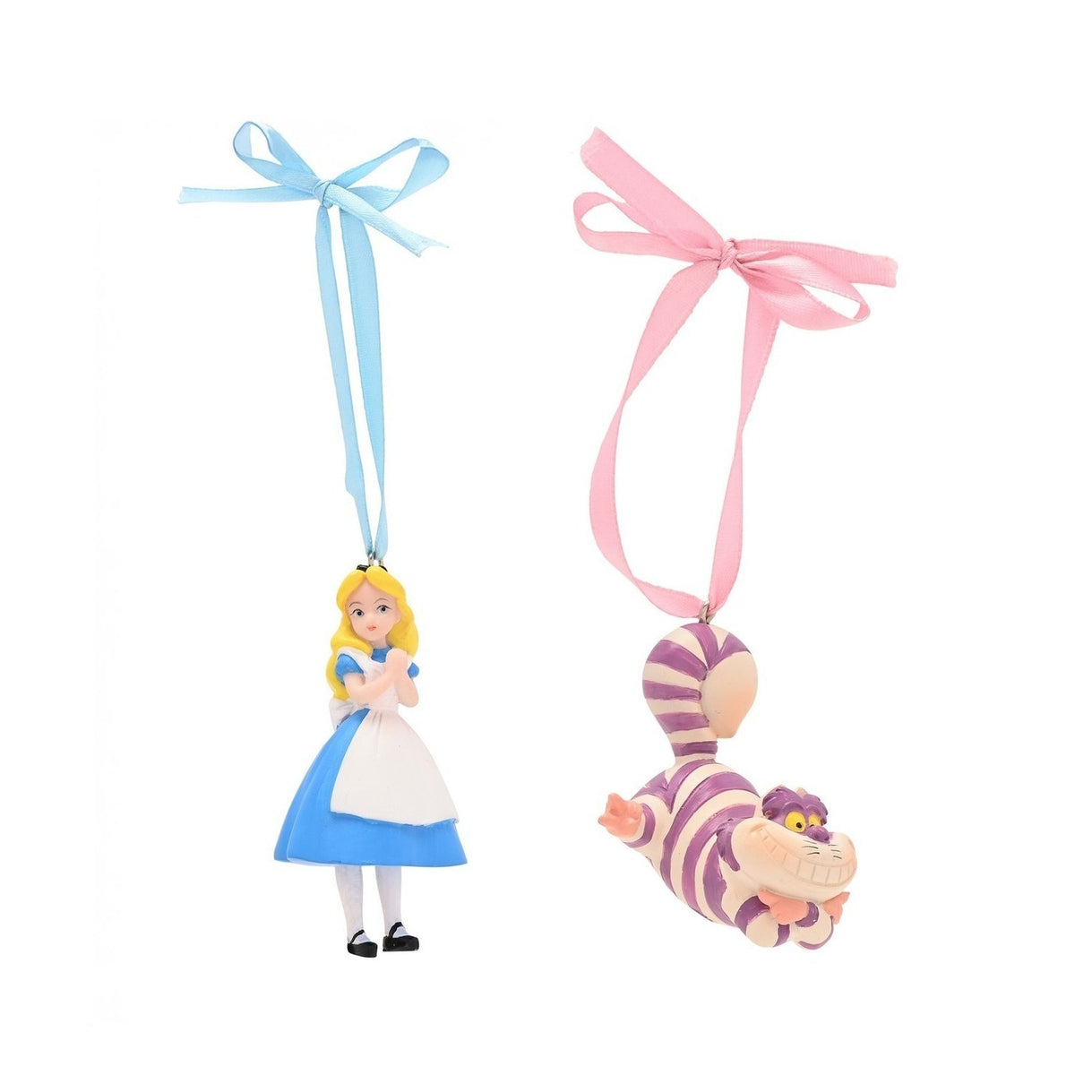 Alice and Cheshire Cat resin Christmas tree decorations with ribbon hangers, Alice in blue dress with white apron on blue ribbon, striped Cheshire Cat on pink ribbon.
