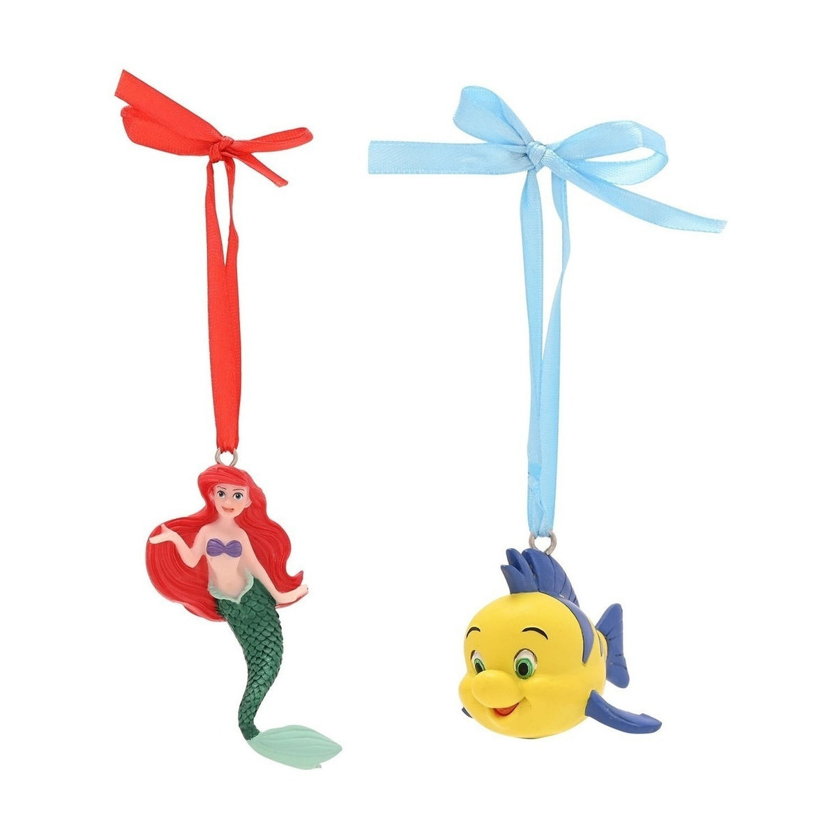 Ariel and Flounder hanging Christmas decorations in resin, Ariel with red hair and green tail on a red ribbon, Flounder yellow with blue fins on a light blue ribbon, plain white background.