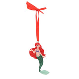 Resin Ariel hanging Christmas tree decoration with red hair, purple shell top and green scaled tail, suspended from a red ribbon bow against a plain white background.