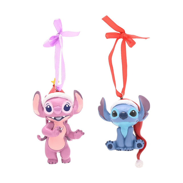 Set of 2 hanging resin Christmas tree decorations featuring Angel in pink and Stitch in blue, both wearing Santa hats, with ribbon loops on a white background.