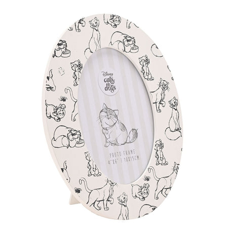 Oval wooden photo frame in white with black line-drawn Aristocats cats, paw prints and butterflies around a 6 x 4in opening, shown on a plain white background.