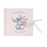 Square pale pink Ohana Stitch baby photo album with Stitch hugging a pink friend under stars and moons, grey gingham ribbon tie, plain white background.