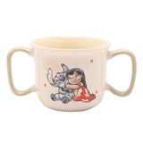 Lilo and Stitch Baby Double Handed Porcelain Mug in cream with sage-green handles, printed with Lilo hugging Stitch and small star details, shown on a plain white background.