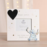 White wooden square photo frame with a black chalkboard heart, "days until we meet our little one" text, gold stars, moons, and a raised Stitch cut-out beside the 4x3in scan photo window.