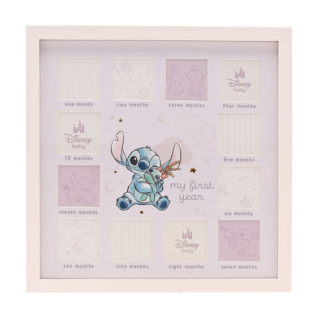 White wooden multi-aperture photo frame with twelve pink labelled squares for each month, Stitch hugging a toy at centre amid clouds and stars.