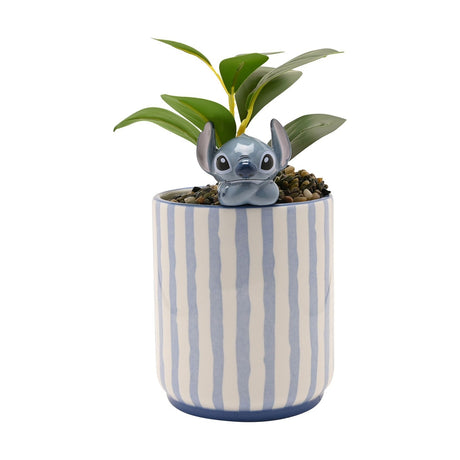 Blue and white striped stoneware planter with a faux green plant and a 3D glossy grey-blue Stitch figure peeking over the rim, shown on a plain white background.