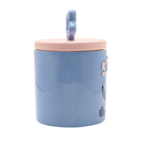 Stitch Stoneware Storage Jar with Star Knob 900ml in blue, round ceramic body with raised pink STITCH lettering and pink lid with wavy star handle, shown on a white background.