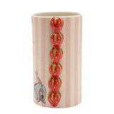 Winnie the Pooh Strawberry Stoneware Vase in pink and cream stripes, featuring a column of six raised red strawberries down the side and Eeyore with Piglet near the base, on a plain white background.