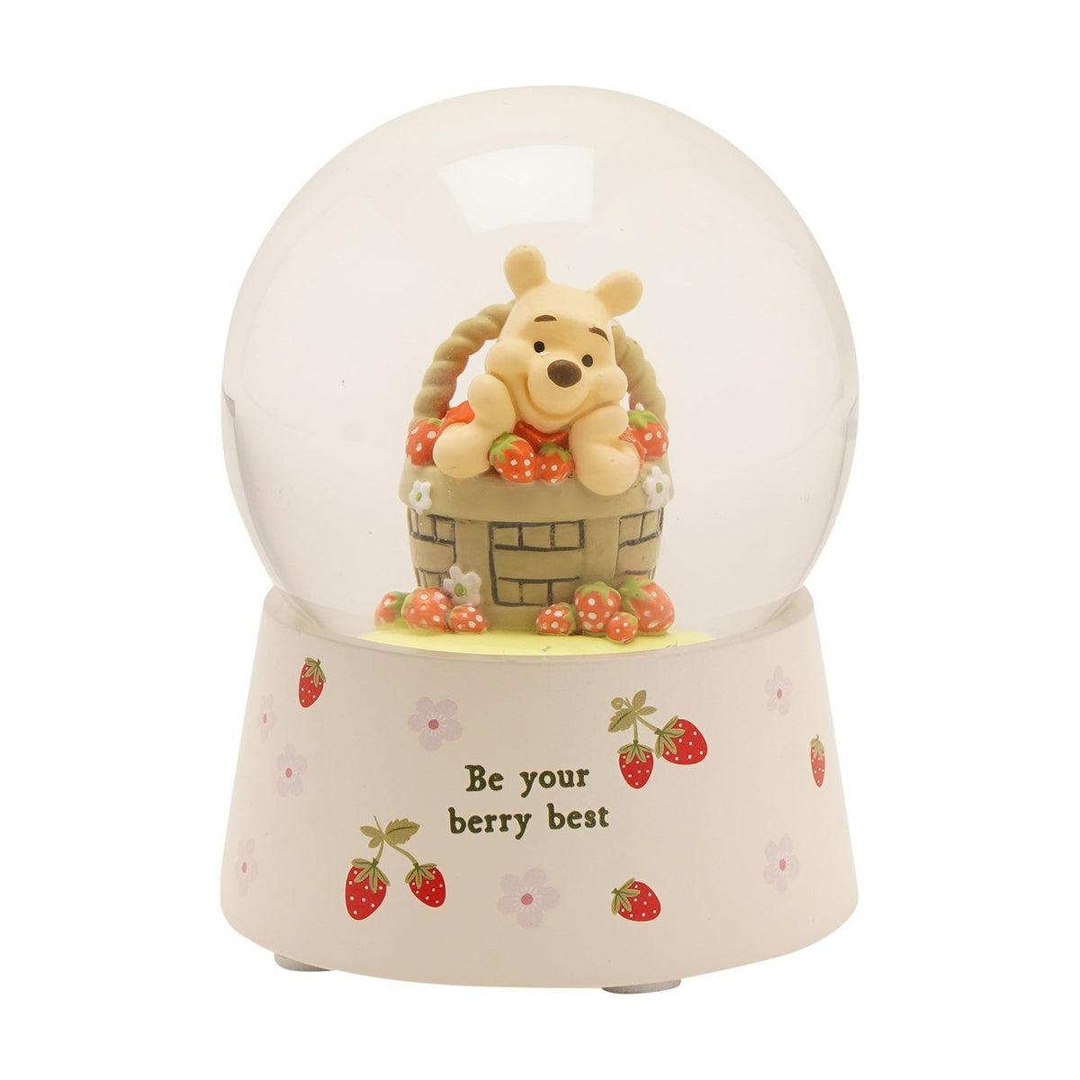 Winnie the Pooh Basket Snow Globe with Strawberries in cream resin, Pooh peeking from a woven basket inside a clear globe on a floral strawberry-print base, plain white background.