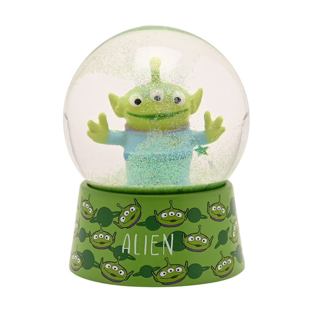 Toy Story Alien glitter plastic snow globe with three-eyed green alien, arms outstretched, inside a clear globe with green glitter on a green alien-print base.