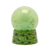 Toy Story Alien glitter plastic snow globe with green glitter and star accents, set on a round green base printed with Alien character faces, shown on a plain white background.