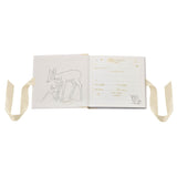 Open white Bambi baby photo album with cream ribbon ties, showing a sketched Bambi and fawn page beside an "All About Me" details page for name, weight, and height.