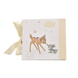 White square photo album featuring Bambi and Thumper on the cover, with a cream striped spine and cream ribbon tie, shown on a plain white background.