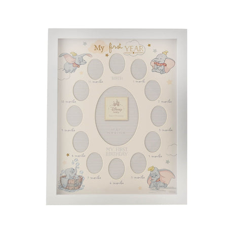 White rectangular multi-aperture photo frame with "My First Year" in gold text, Dumbo illustrations in corners, and oval cutouts for Birth to 11 months around a central photo space.