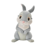 Bambi Thumper Rabbit money box in grey, seated figure with folded paws, white tufted chest, pink nose and ears, big brown eyes, rear coin slot, on a plain white background.