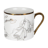 White porcelain Cinderella mug with grey pencil-style sketches of Cinderella and her coach, gold rim and handle, "Cinderella" script, shown on a plain white background.