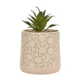 Beige ceramic planter with overlapping Mickey Mouse head outlines, a pink base band, and a faux succulent on pebble topdressing, shown on a white background.