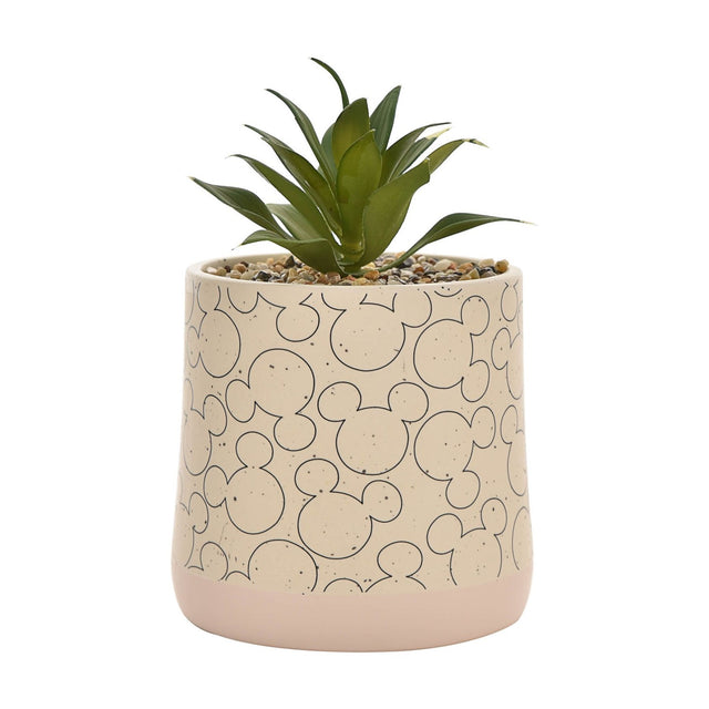 Beige ceramic planter with overlapping Mickey Mouse head outlines, a pink base band, and a faux succulent on pebble topdressing, shown on a white background.