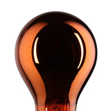 Close-up of a dimmable LED filament bulb, E27 fitting, copper-toned glass A-shape with visible spiral filament glowing warm white, on a plain white background.