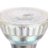 Close-up of a dimmable GU10 LED bulb with faceted clear glass reflector and patterned front lens around a central optic, shown on a plain white background.