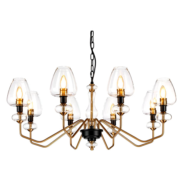 Introducing the Armand 8 Light Chandelier, featuring a sleek and modern aesthetic with eight bulb fixtures, each elegantly enclosed in a clear glass shade. This sophisticated design showcases a gold structure accented by charcoal black paint, complemented by angular arms stemming from a central column. The chandelier is suspended gracefully by a black chain, emphasizing its elegant aged brass plated finish.